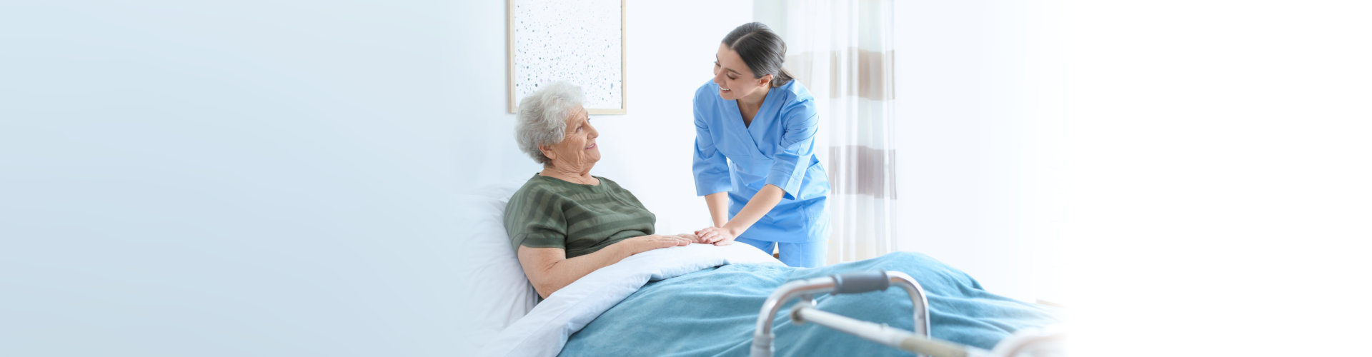 caregiver assisting senior patient