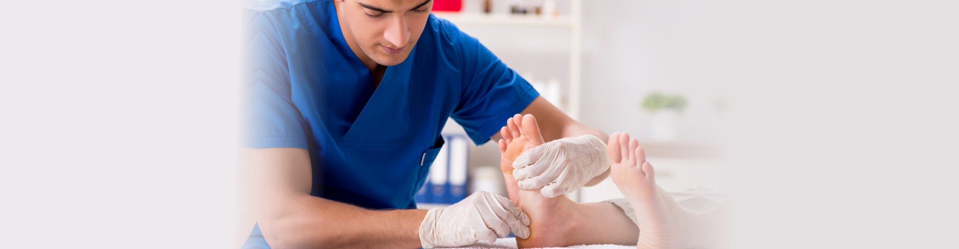 health worker massaging feet of patient